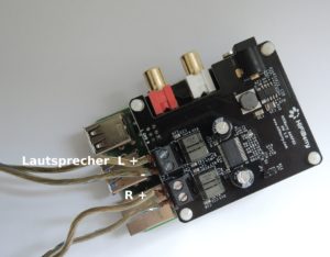 Abbildung 4: In die beiden linken Klemmanschlüsse des Aamp60 stecken Sie die Kabel vom linken Lautsprecher, daneben die des rechten.